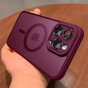 Purple Matte translucent magnetic iPhone case with camera lens protection and MagSafe held by a hand on a wooden surface