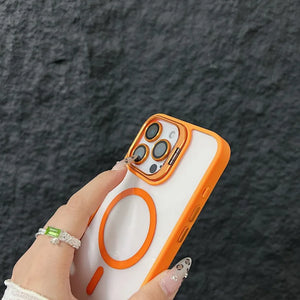 Hand holding a iphone with an orange and white case against a dark textured background