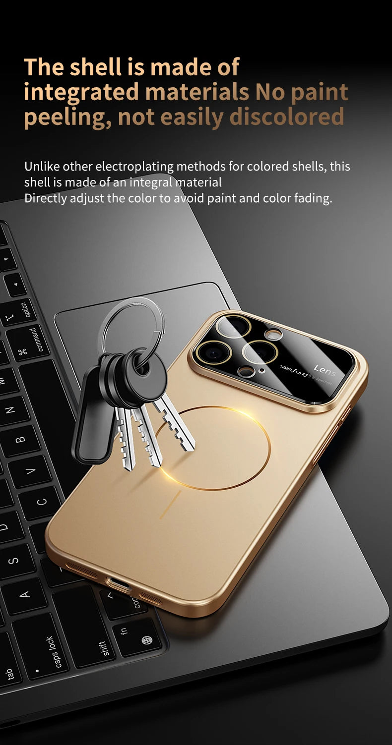 Gold phone case with keychain on a laptop