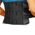Black waist support belt for lower back worn by a person with anatomical illustrations of the spine.