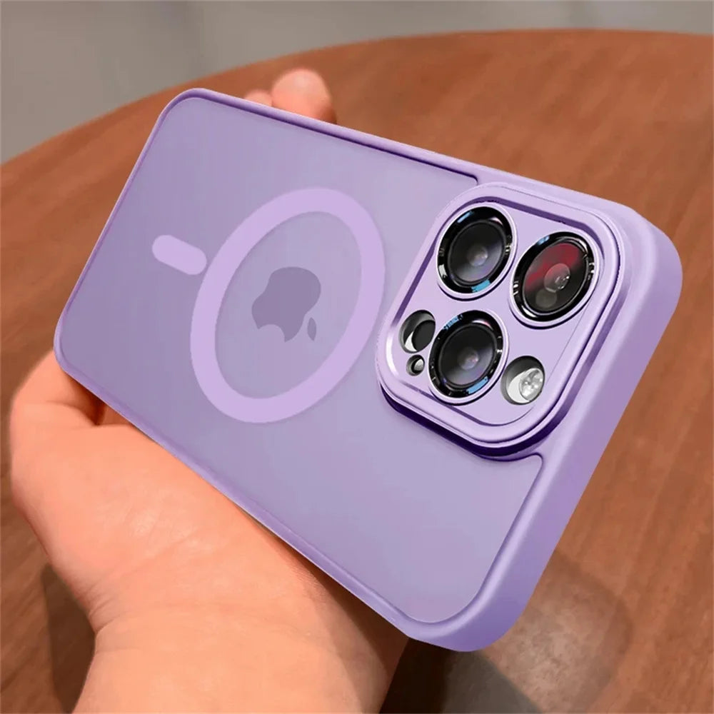 Purple Matte translucent magnetic iPhone case with camera lens protection and MagSafe held by a hand on a wooden surface