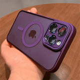 Purple Matte translucent magnetic iPhone case with camera lens protection and MagSafe held by a hand on a wooden surface