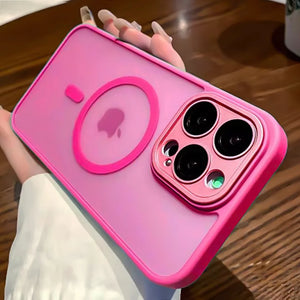 Pink Matte translucent magnetic iPhone case with camera lens protection and MagSafe held by a person on a wooden surface