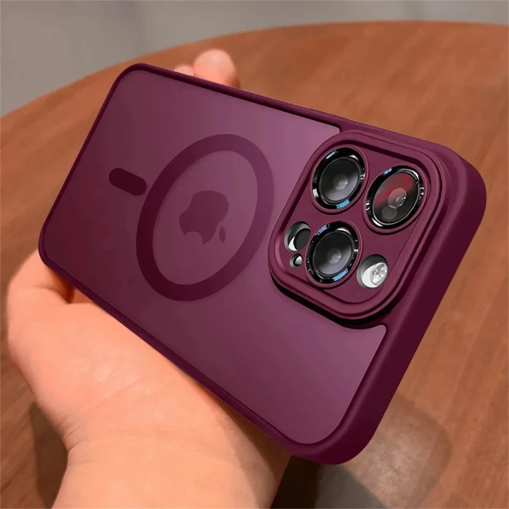 Purple Matte translucent magnetic iPhone case with camera lens protection and MagSafe held by a hand on a wooden surface