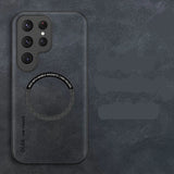 Black leather phone case with 'Luxury Leather' text on a dark gray background