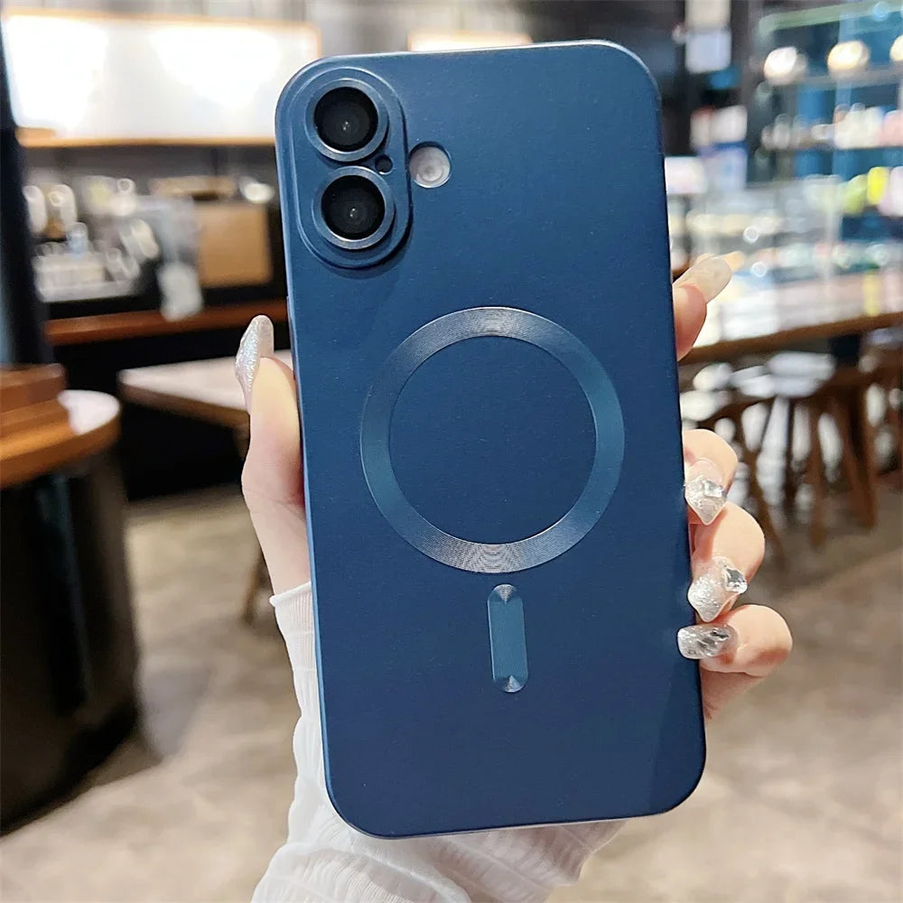 Blue phone case with a circular design held by a person in a blurred indoor setting