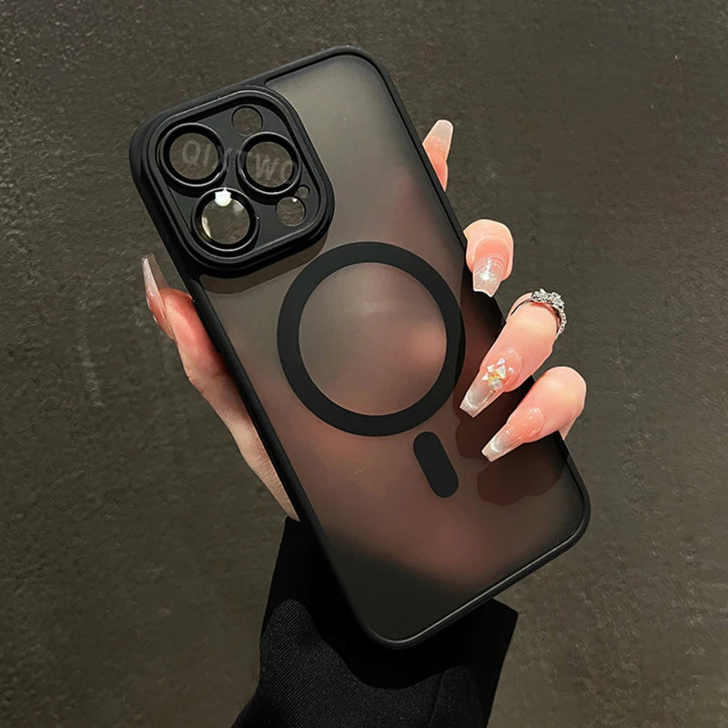 Hand holding a Matte magnetic iPhone case compatible with Magsafe wireless charging with a dark background